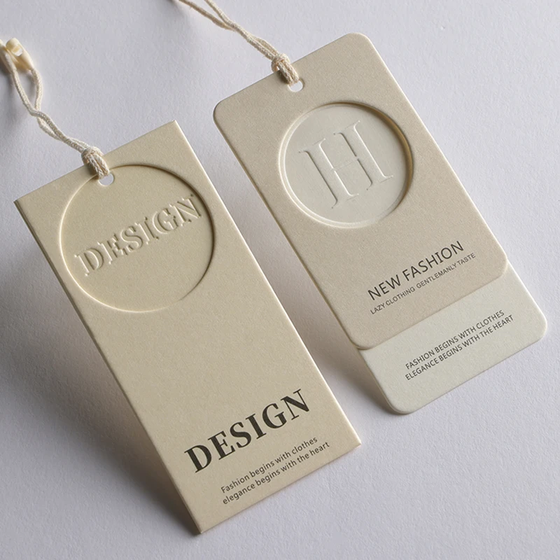 

Custom Luxury Clothing Paper Swing Hanging Tags Clothing Price Labels, 500gsm Cotton Paper Embossed Brand Tags Customization