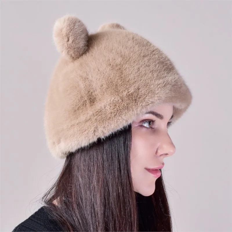 The fur hat for women artificial with a cover and ears is very cute