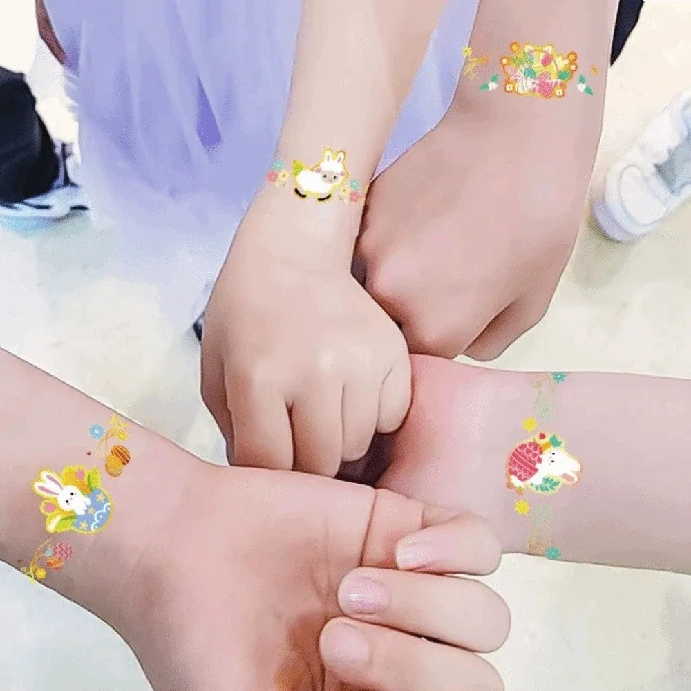 

Временная татуировка на запястье, руку, лицо, ногу: кролик, морковь, яйца. Одноразовая, долговечная, мультяшная.