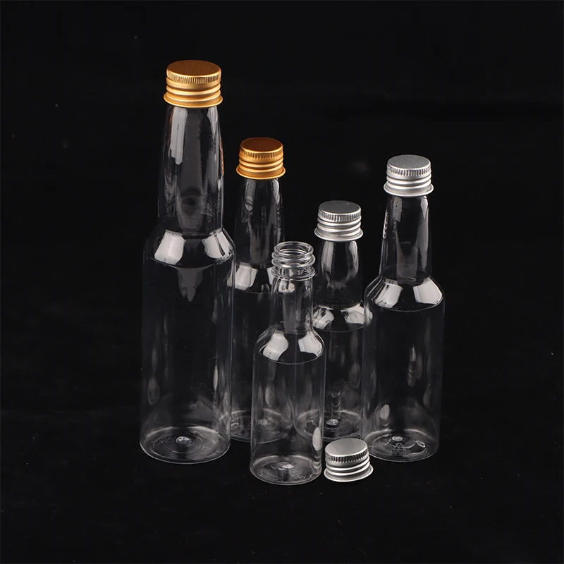 Bottiglie di spirito in plastica Mini bottiglie di liquore Mini bottiglia di colpo di alcol in plastica con tappo Bottiglia di latte Bottiglia di bevande trasparente
