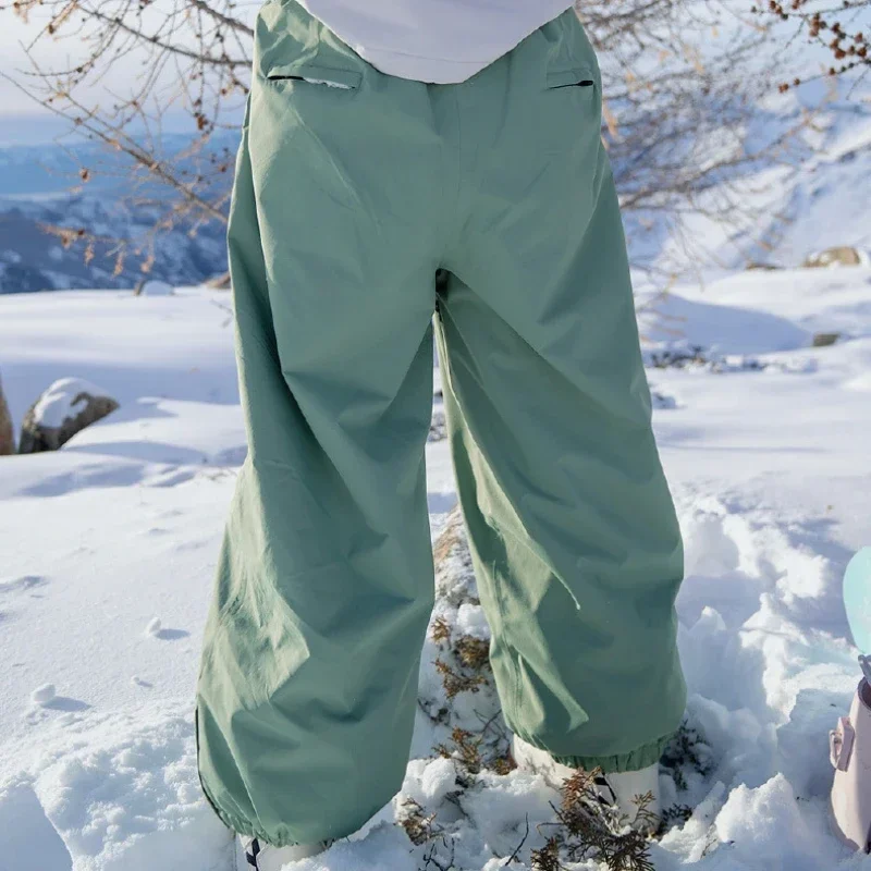 Pantalones de esquí a prueba de viento para hombres y mujeres, pantalones de esquí impermeables para exteriores, pantalones de nieve cálidos, monos