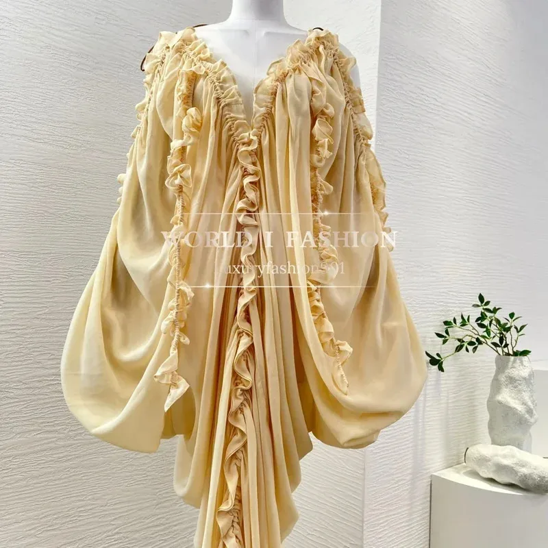 فستان نسائي عالي الجودة موديل 2025 أنيق أصفر مكشكش وأكمام طويلة غير متماثل