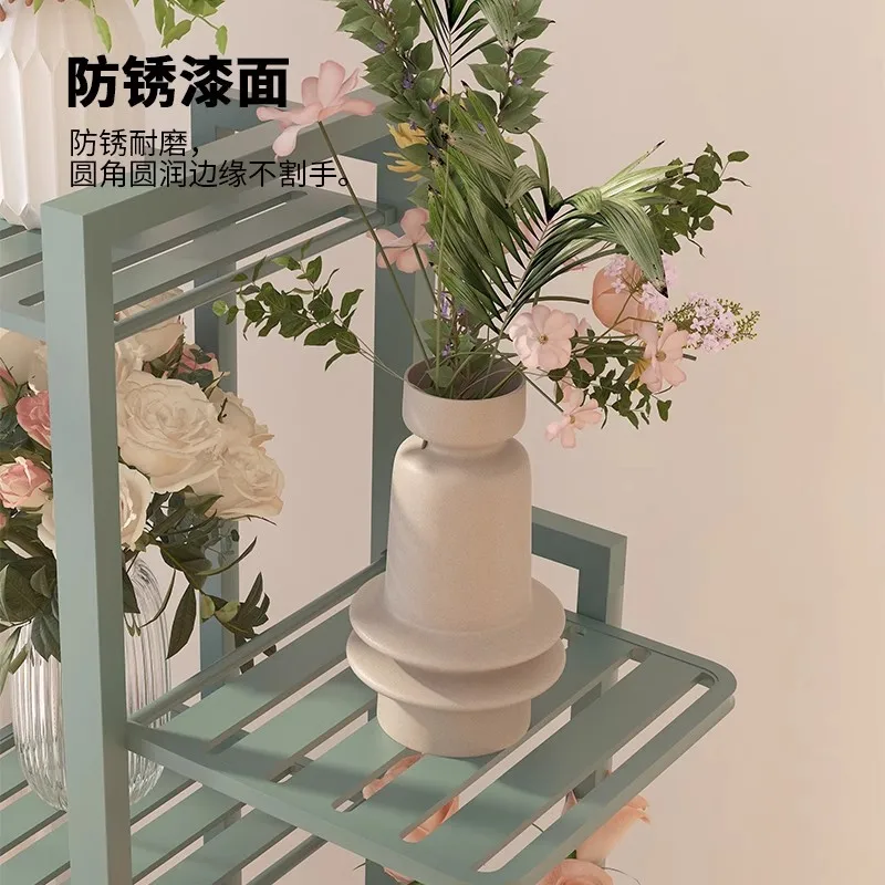 رف زهور للشرفة الداخلية والشبت الأخضر وأرضية متعددة الطبقات مع عجلات رف زهور حديدي مزورة لغرفة المعيشة رف أحواض زهور بسيط
