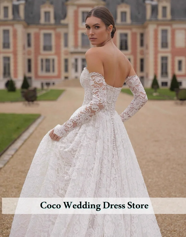 فستان زفاف أنيق مخصص من الدانتيل مثير بدون حمالات مع أكمام قابلة للفصل فستان زفاف طويل لحفلات الزفاف