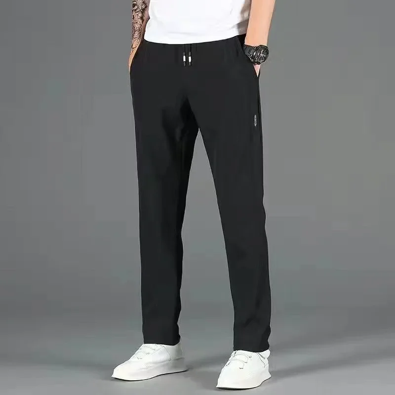 Pantaloni casual estivi da uomo in seta di ghiaccio sottile vestibilità ampia pantaloni sportivi a gamba dritta traspiranti ad asciugatura rapida comodi jeans larghi