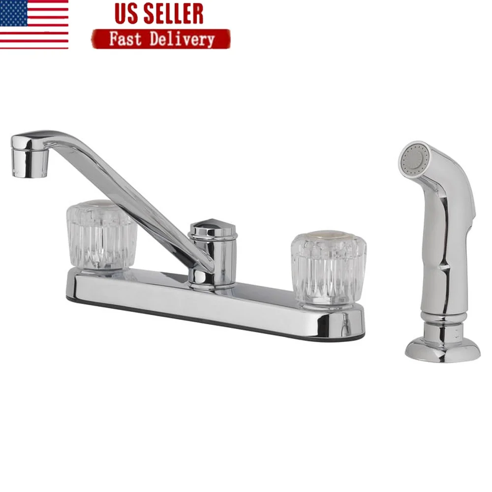 

Кухонный смеситель с двумя ручками и боковым распылителем. Хромированная отделка. Прочные латунные хвостовики. Простая установка. Универсальный дизайн. Для домашнего использования.