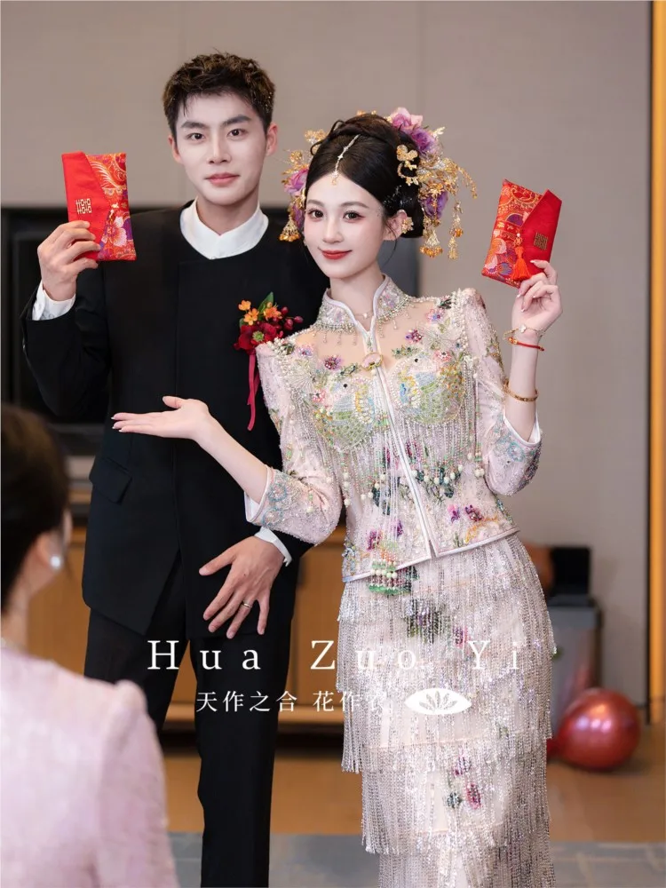 The light-colored wedding dress is used to rework bride's fishtail