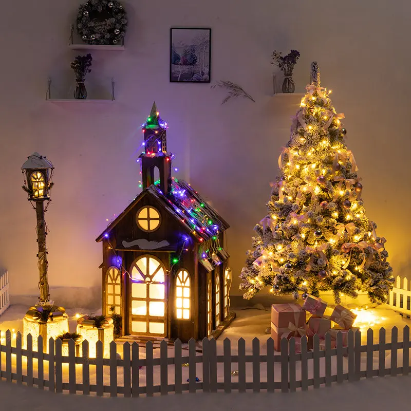 Christmas decorations: glowing wooden cabin windmills, large hotel scene setups, mall snowman ornament sets