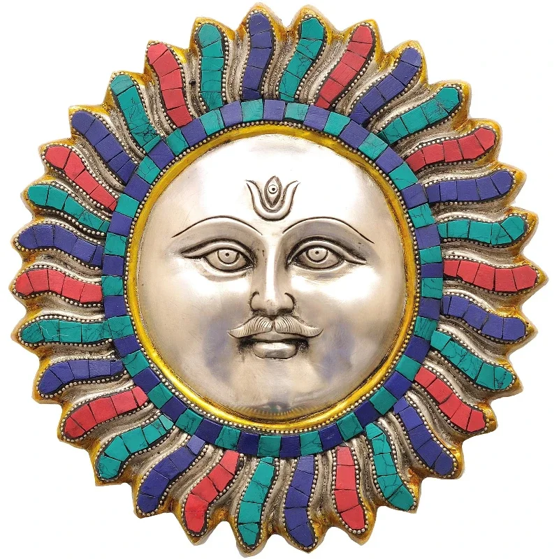 A handmade 9-inch Lord Surya hangs on a brass wall made in India