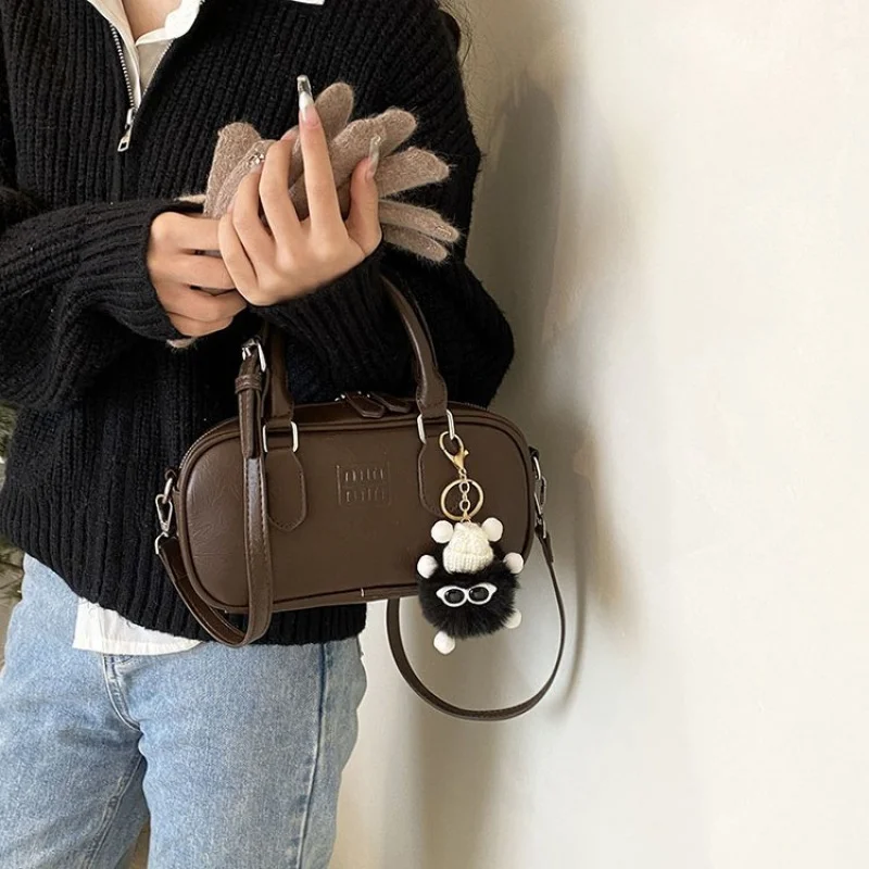 

Women's Messenger Bag By Luxury Brand, Made Of Durable Leather, Spacious With Pockets, Ideal For Work Or School Use