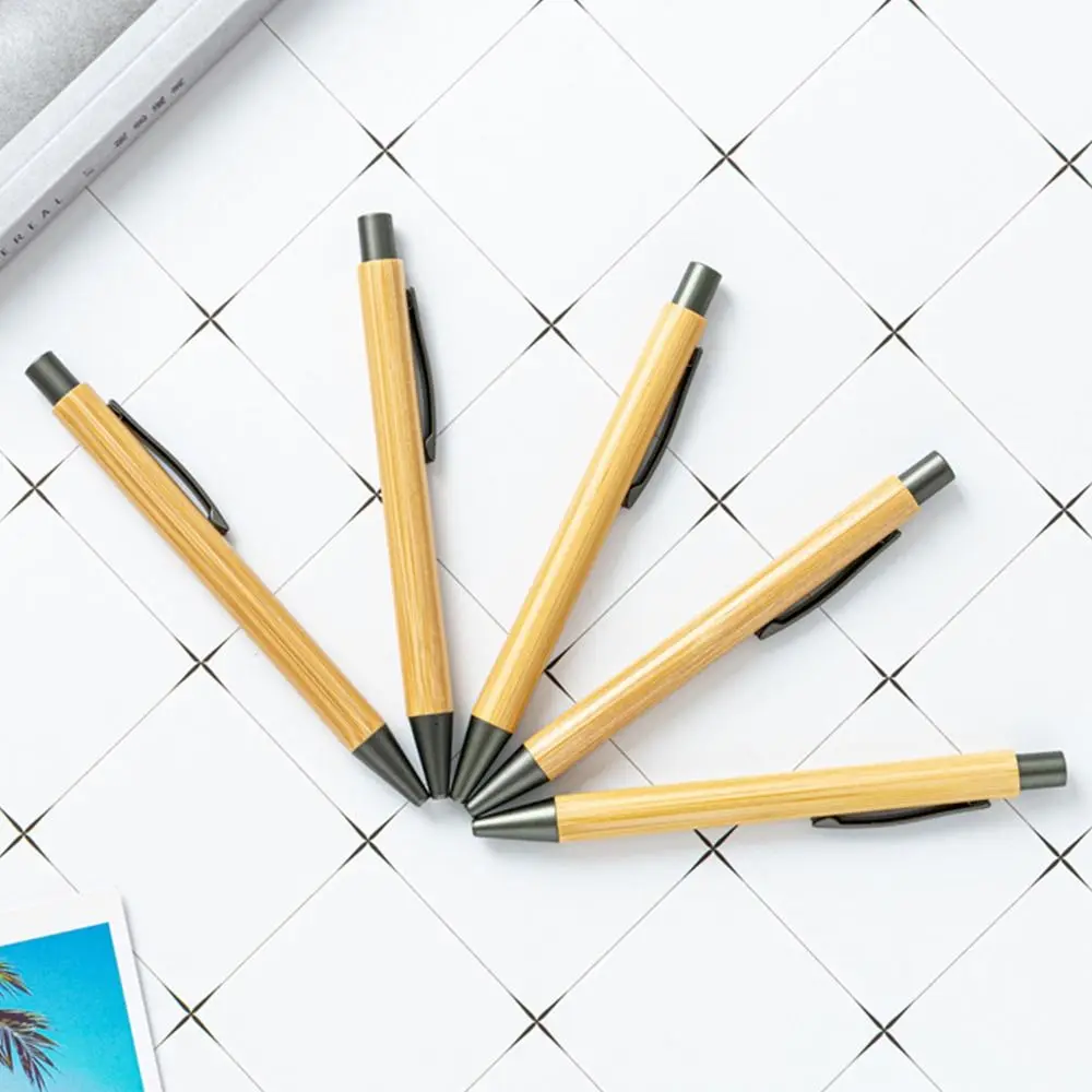 10PCS Creative Bamboo Bamboo Pen Writing Black Ink Gel Pen Press Type Business Office Pen forniture per l'apprendimento