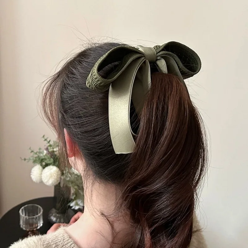 

Новый осенне-зимний корейский вязаный зажим с бантом и высоким хвостом для женщин, простой универсальный большой нескользящий витой зажим-банан