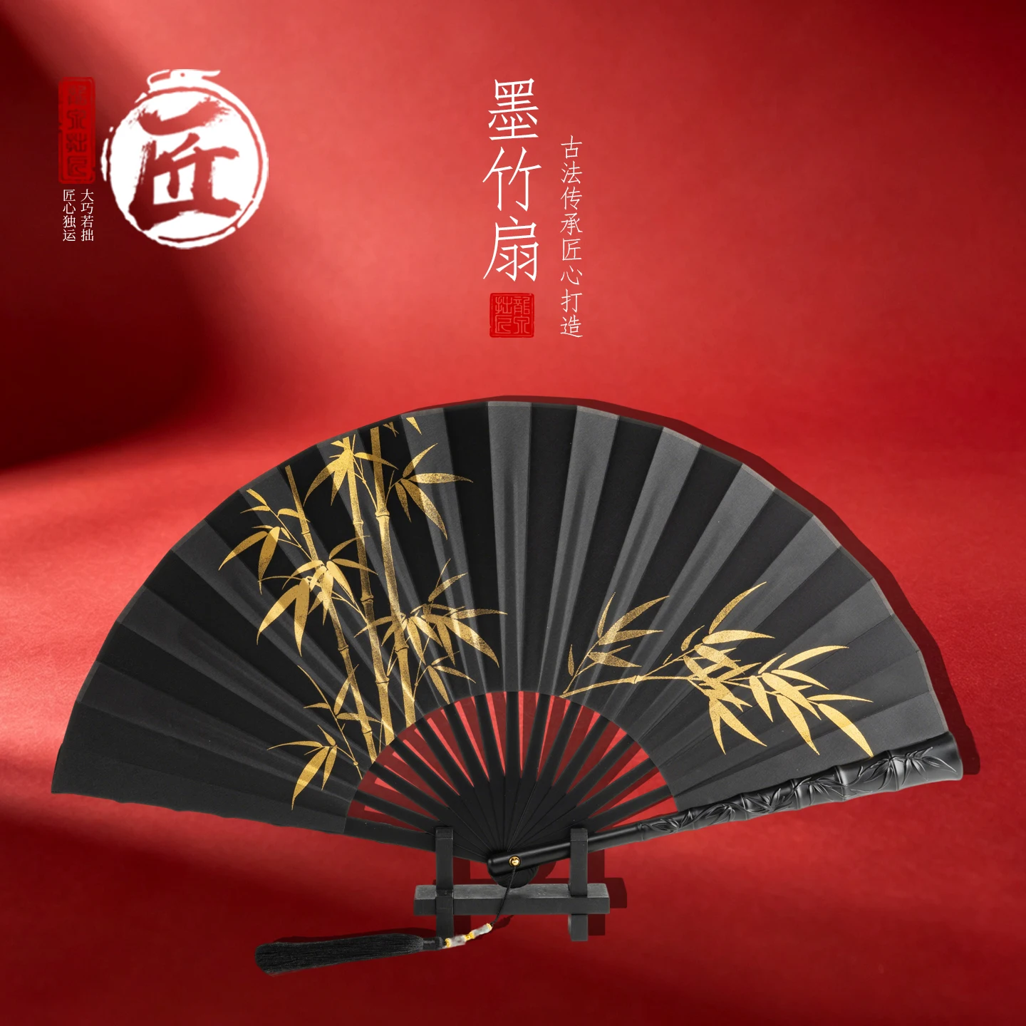 

Golden Bamboo Folding Fan Black Alloy Ribs Black Fabric with Gold Foil Print Traditional Chinese Style