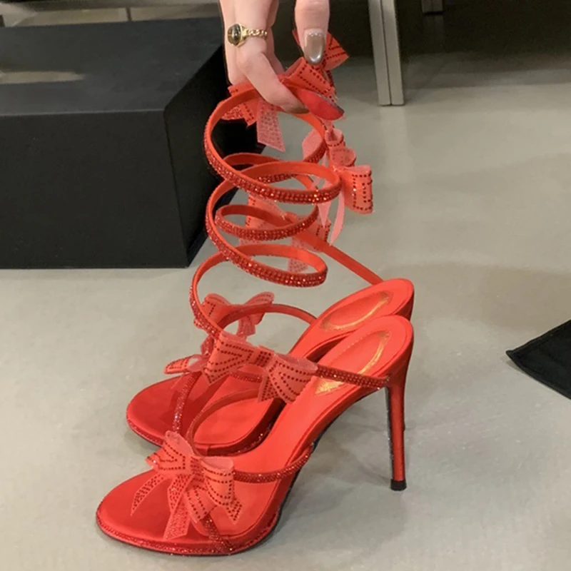 

Aneikeh Sexy CRYSTAL Bow High Heels Sandals Red Wedding Shoes Woman Summer Ankle Strap Thin High Heels Open Toed Party Shoes