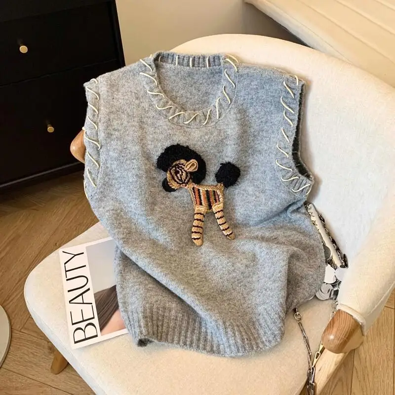 

Korean version of sweet embroidered knitted spring new design fashionable and versatile stacking vest for age reduction