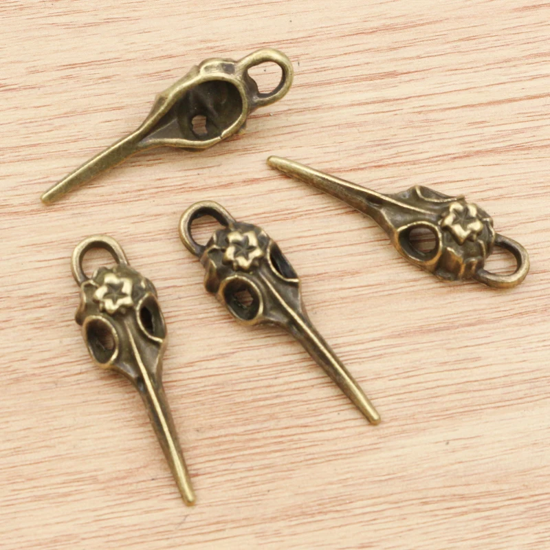 4pcs 41x13mm Antique Silver Plated Bronze Plated Hollow Beak Skull Head Handmade Charms Pendant:DIY for bracelet necklace