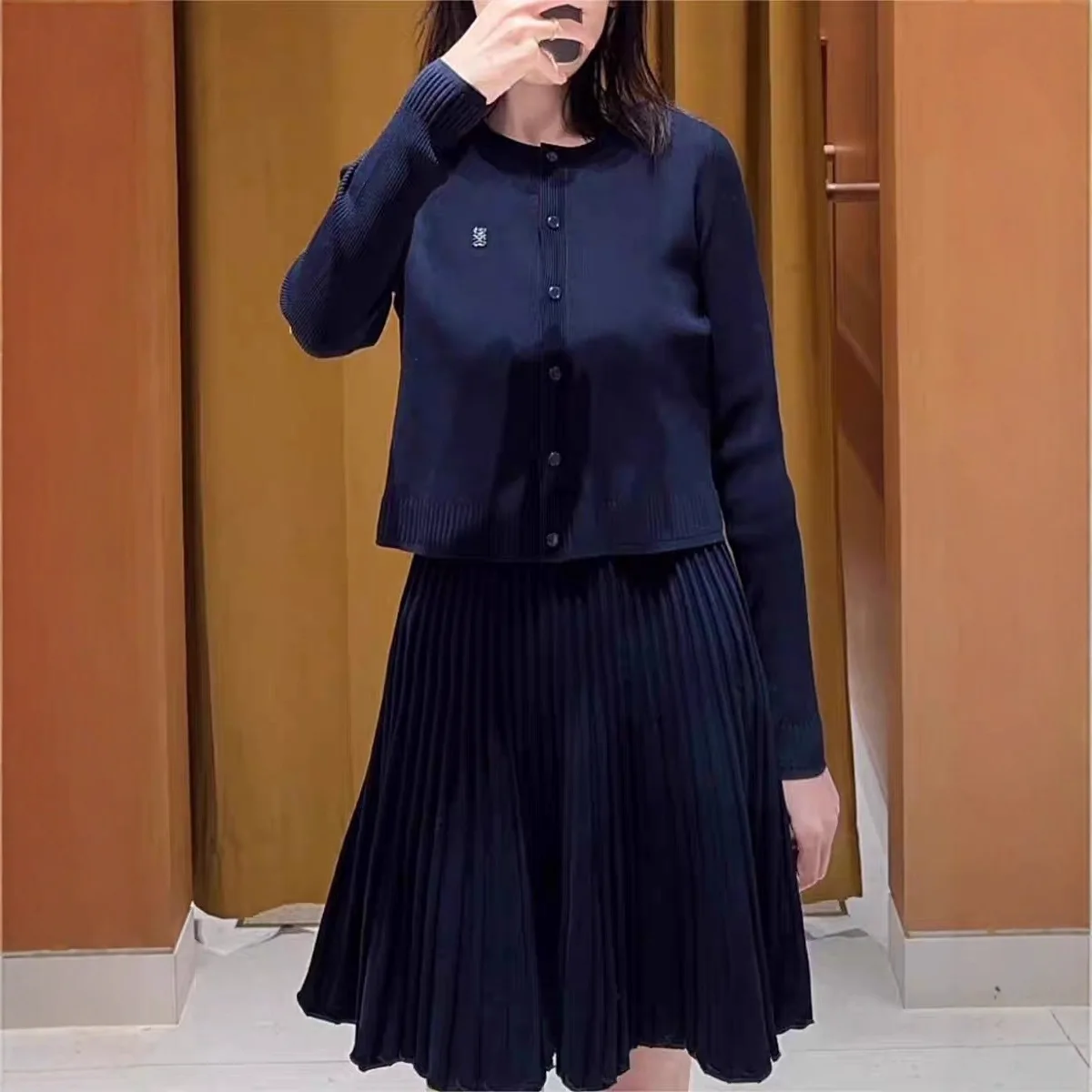 

2025 autumn and winter women's elegant two-piece notice long-sleeved cardigan or slim-fitting suspender mini dress