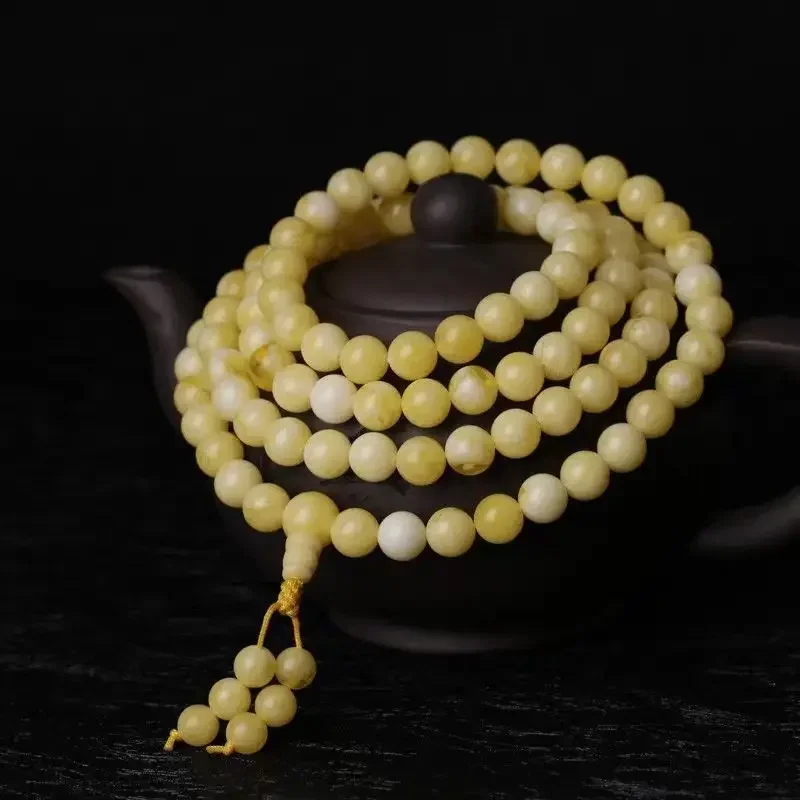 

UMQ Natural old material beeswax bracelet chanterelle yellow multi-circle yellow amber bracelet men's and women's Buddha bead