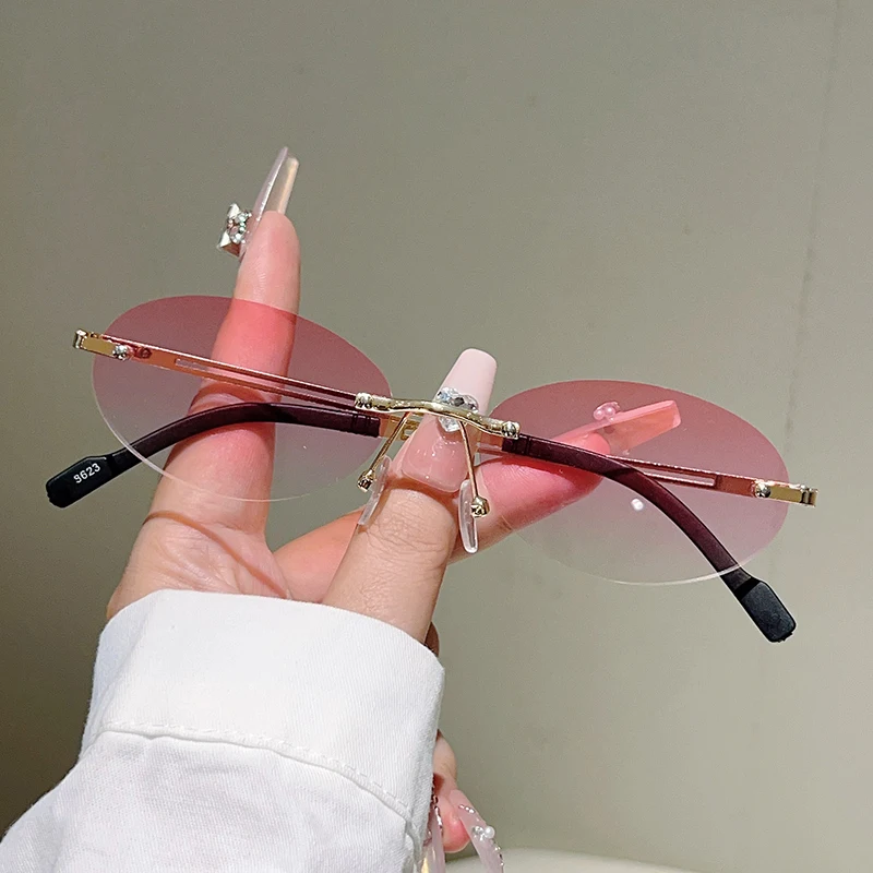 بدون شفة البيضاوي النظارات الشمسية النساء أزياء التدرج ديكور ظلال النظارات الجديدة العصرية خمر العلامة التجارية تصميم النظارات غير رسمية