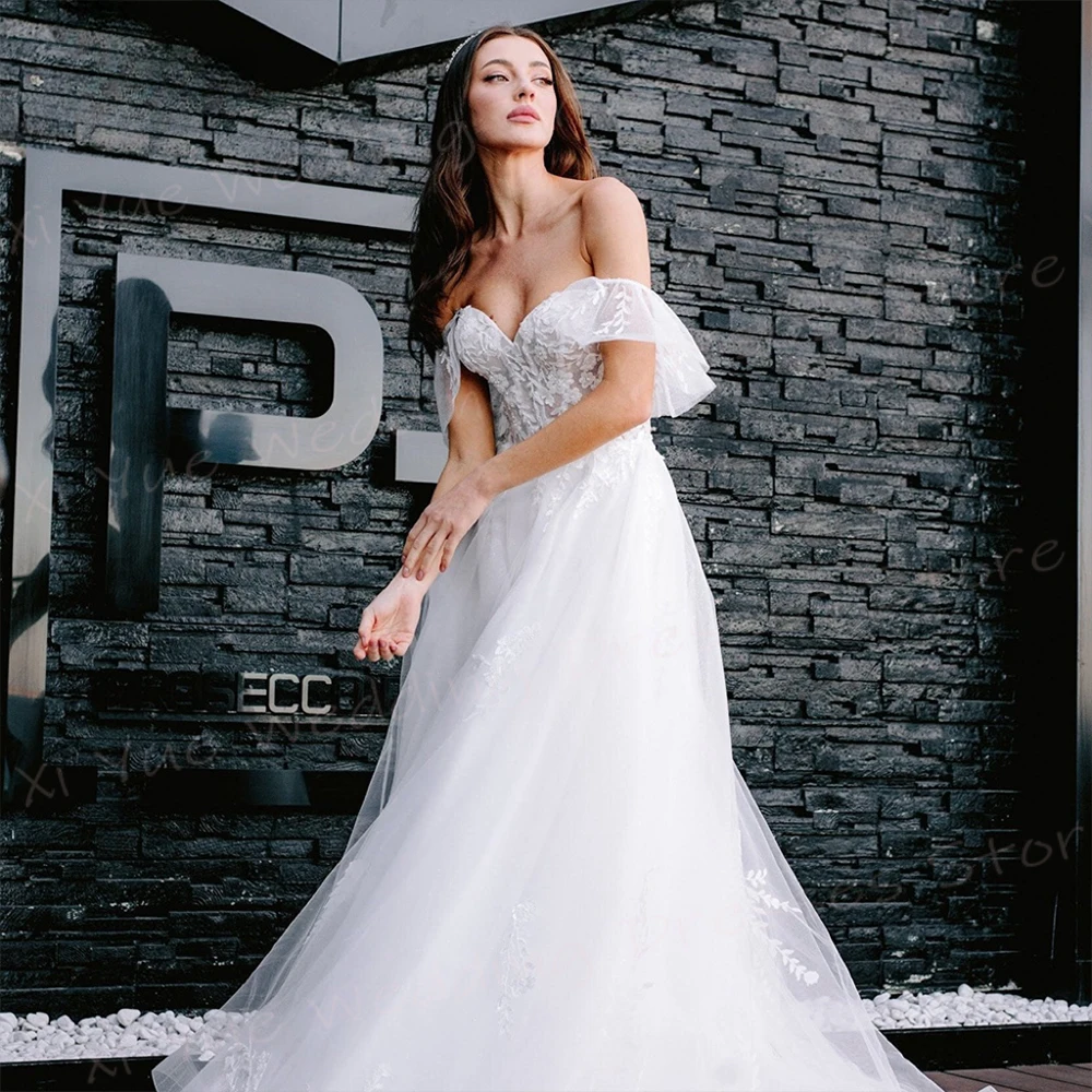 Affascinante una linea abiti da sposa da donna Appliques moderne abiti da sposa in pizzo elegante con spalle scoperte Vestido De Noivas