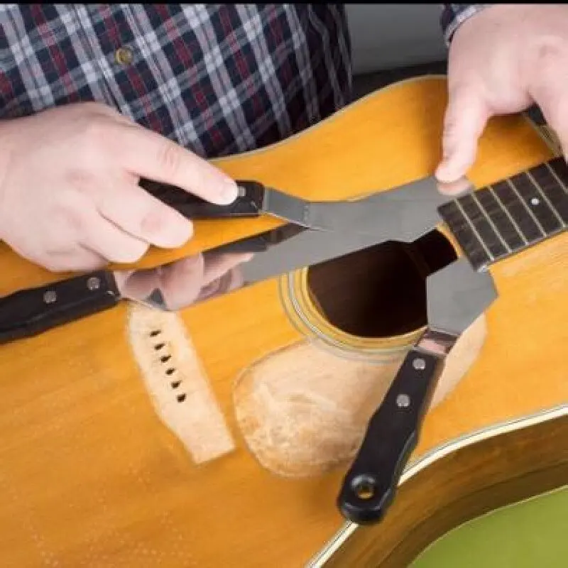 Acoustic guitar repair remove flat shovel