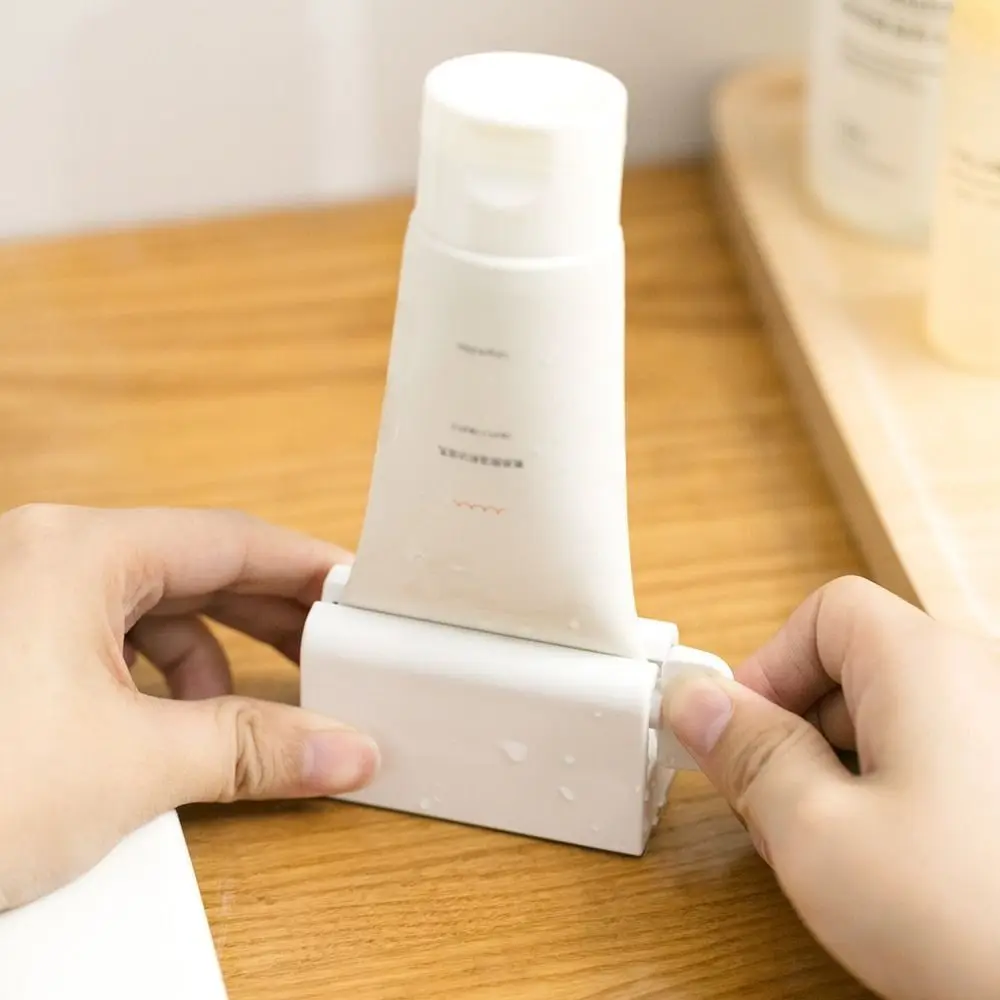

Silicone Base Toothpaste Squeezer Manual Rotating Efficient Usage Toothpaste Dispenser Rotatable Handle Labor-Saving