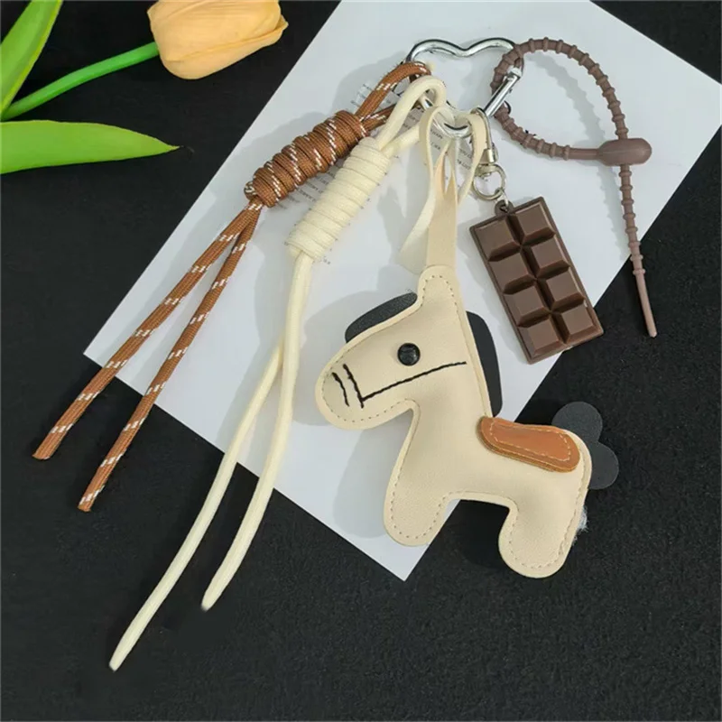 جديد INS نمط الجلود الحصان العام حقيبة الهاتف المحمول حبل معلق الإبداعية الهاتف الحقيبة المفاتيح ملحق من البر الرئيسى للصين