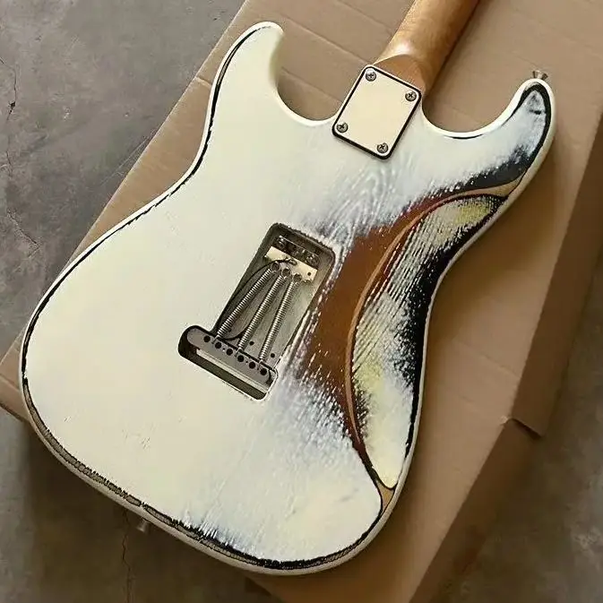 White six-string old electric guitar, basswood body, maple neck, white panel supports personalized customization.