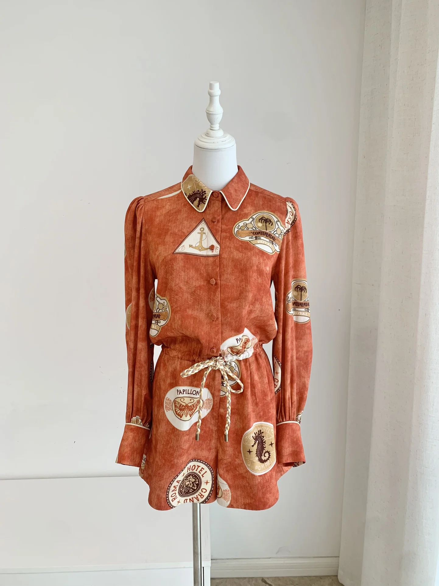 

Women Red Lapel Long Sleeved Seahorse Printed Fashionable Jumpsuit