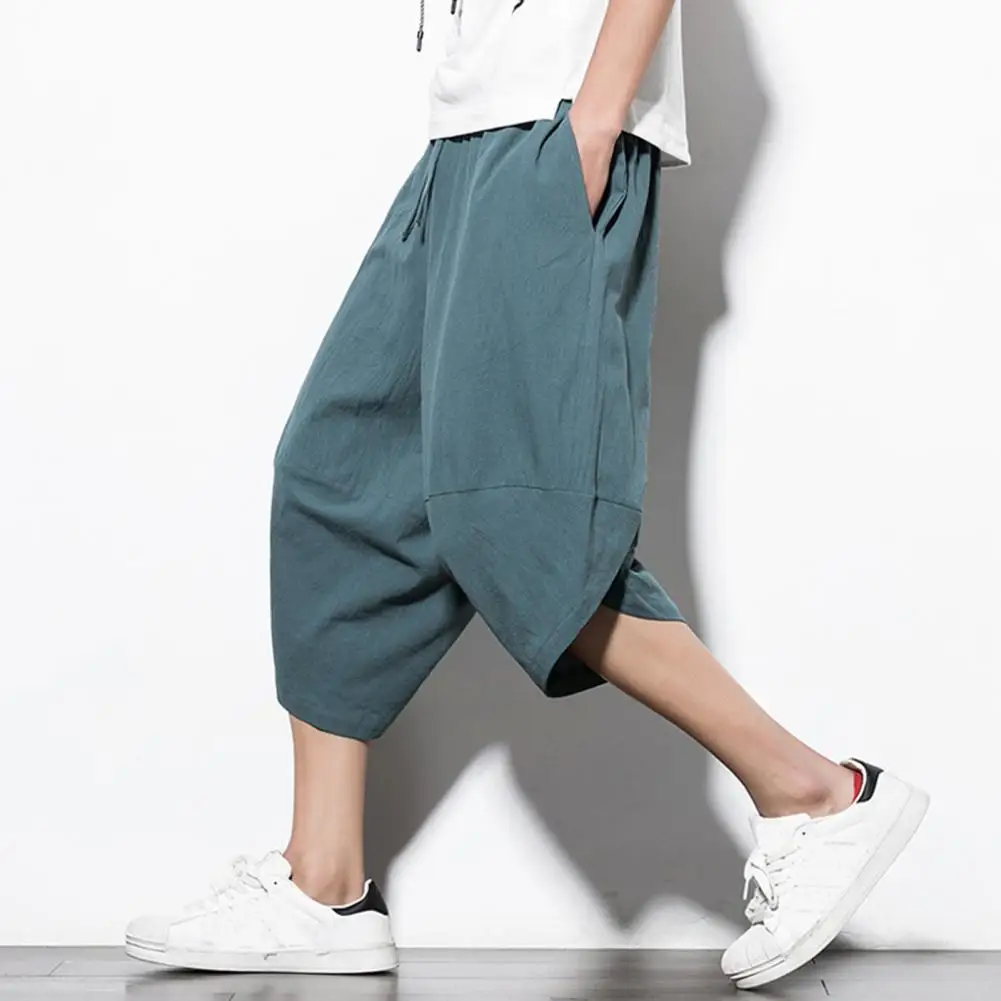 

Cropped Pants Solid Color Men Pants Loose Soft Sweat Absorption Men Drawstring Baggy Pants with Pockets Sweatpants