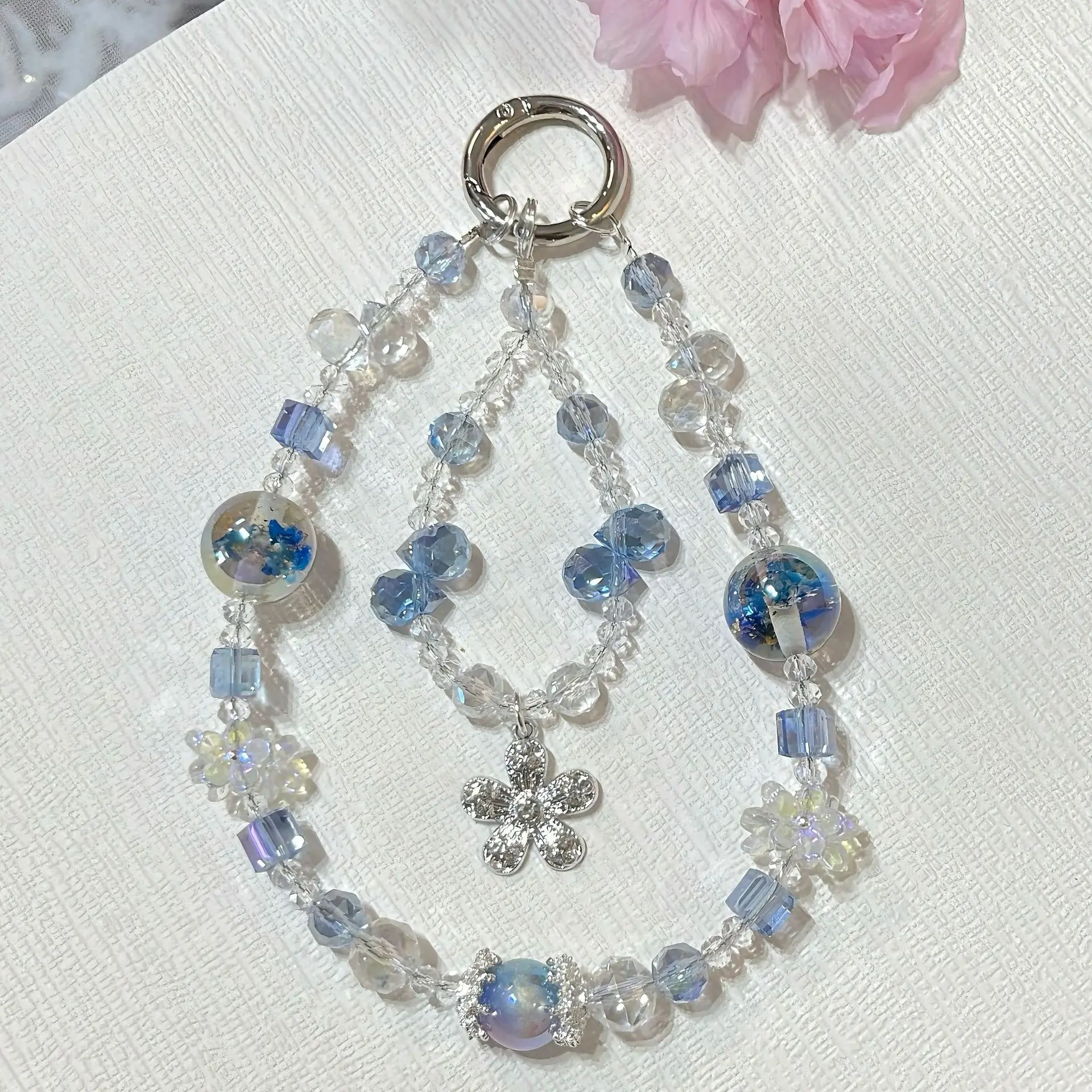 

Luxury Ice Blue Crystal Beaded Phone Lanyard Shimmering Flower Pendant Wrist Strap Aesthetic Double Layer Phone Charm for Women