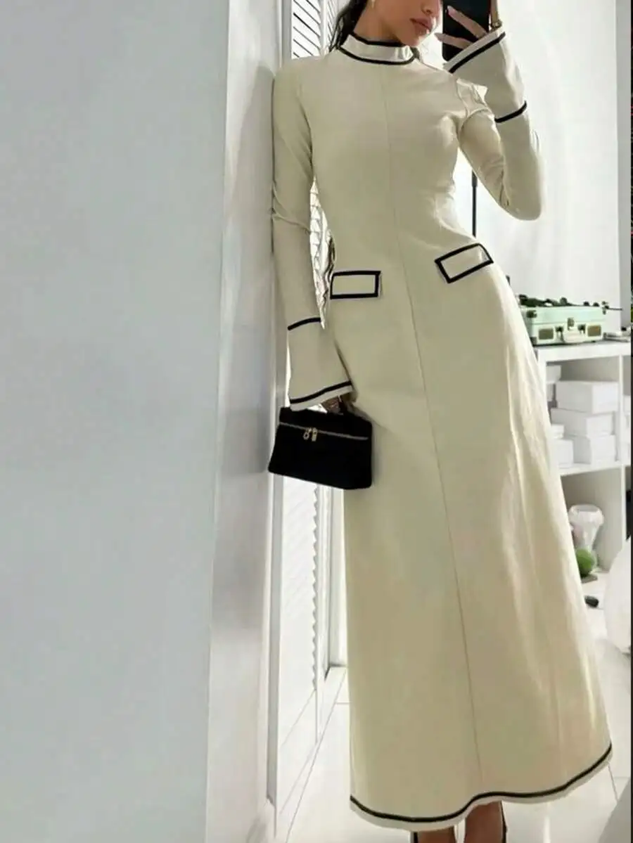 

Cream High Neck Long Sleeve Maxi Dress With Black Piping Detail For Office, Cocktail, And Formal Occasions