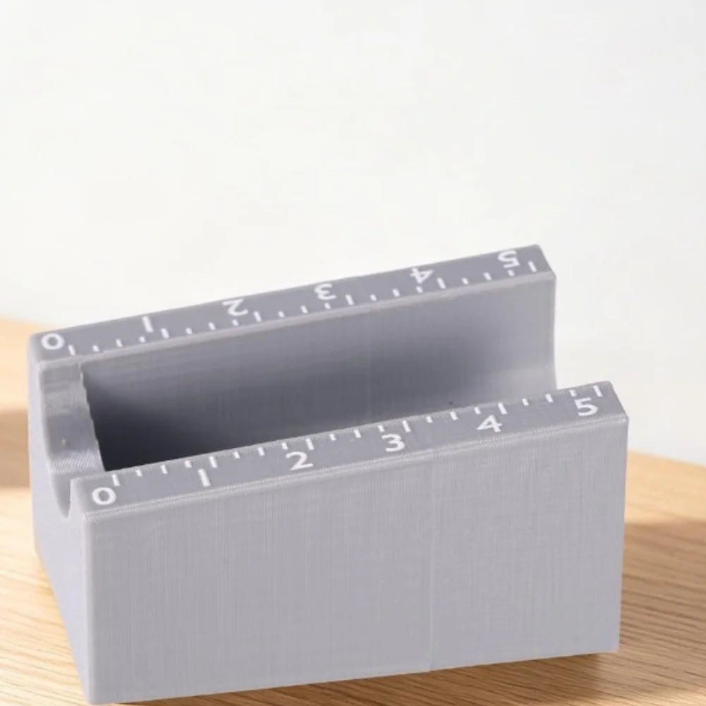 Small Bottle Label Applicator for 3ml and 10ml Vials with Groove-Directed Motion Path to Improve Label Repeatability