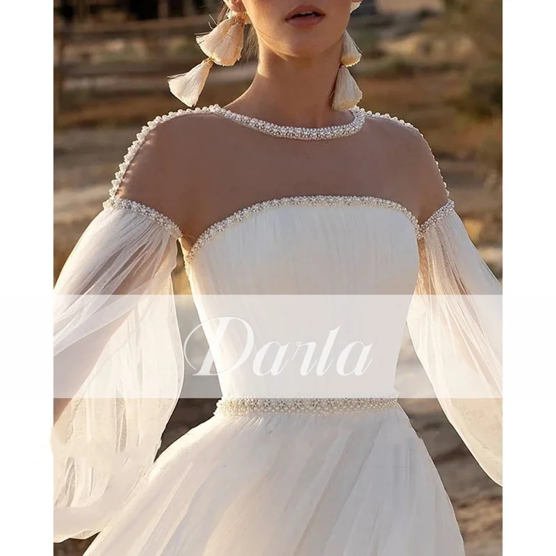 Darla Boho Tulle A-Lineชุดแต่งงานแขนยาวBacklessจีบลูกปัดไข่มุกชุดเจ้าสาวO-คอVestidos De Noviaที่กําหนดเอง