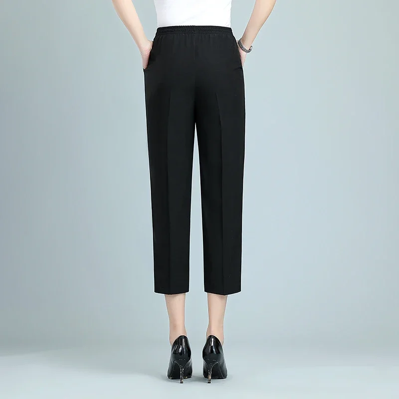 Pantalones negros de 9 colores para mujer, pantalones finos sueltos de cintura elástica, pantalones casuales de Color sólido hasta la pantorrilla para verano