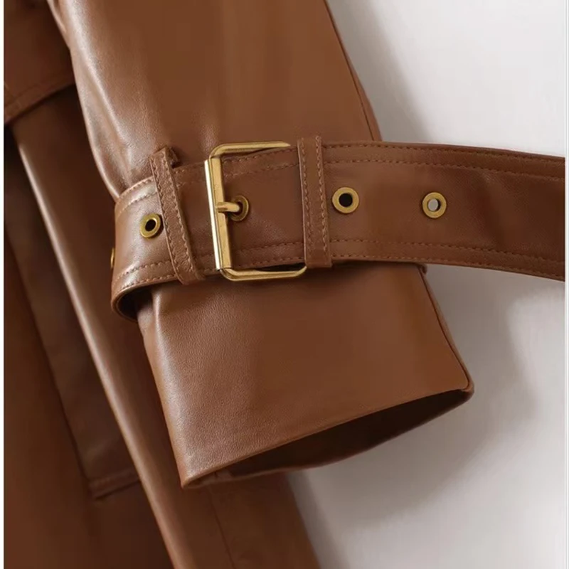 Giacche in pelle di lusso di alta qualità Autunno Inverno Cera olio Pelle di pecora Colletto Cintura Slim Streetwear Trench lungo Donna