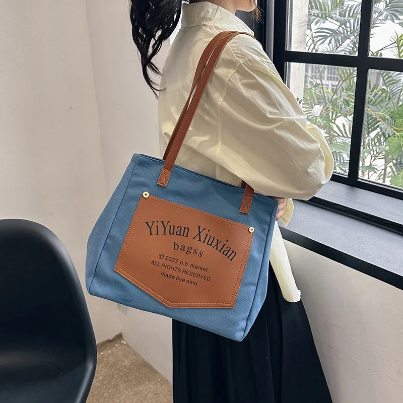 Leisure large-capacity single shoulder bag 2023 new lazy sail cloth commute to class is contracted tote bags