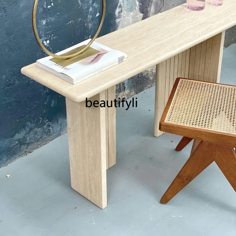 

Italian entrance , living room against the wall, table, travertine foyer, strip case, table, end view table, marble