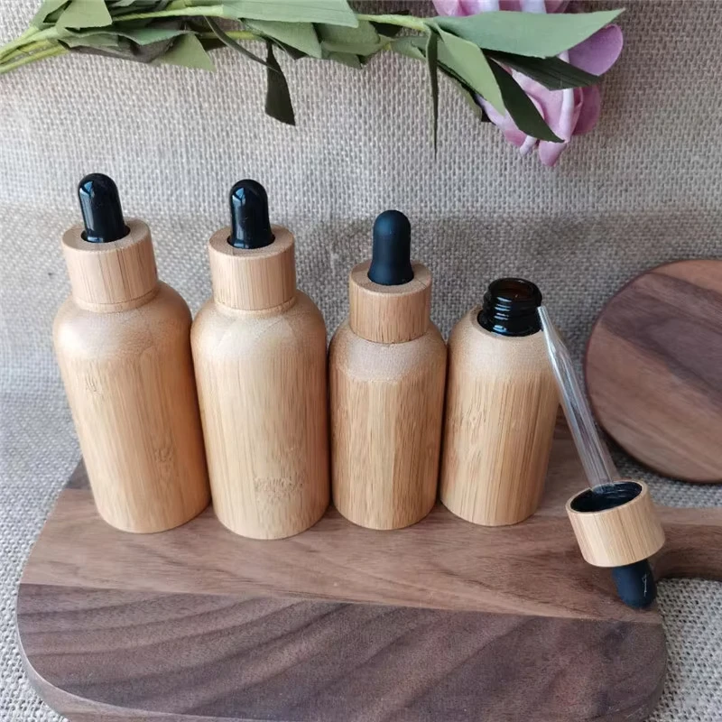 

Essential Oil Empty Bottles Droppe Perfum Black Frosted Cosmetics Container with Wooden Cap Screen-Printed Lotion Cream Bottles
