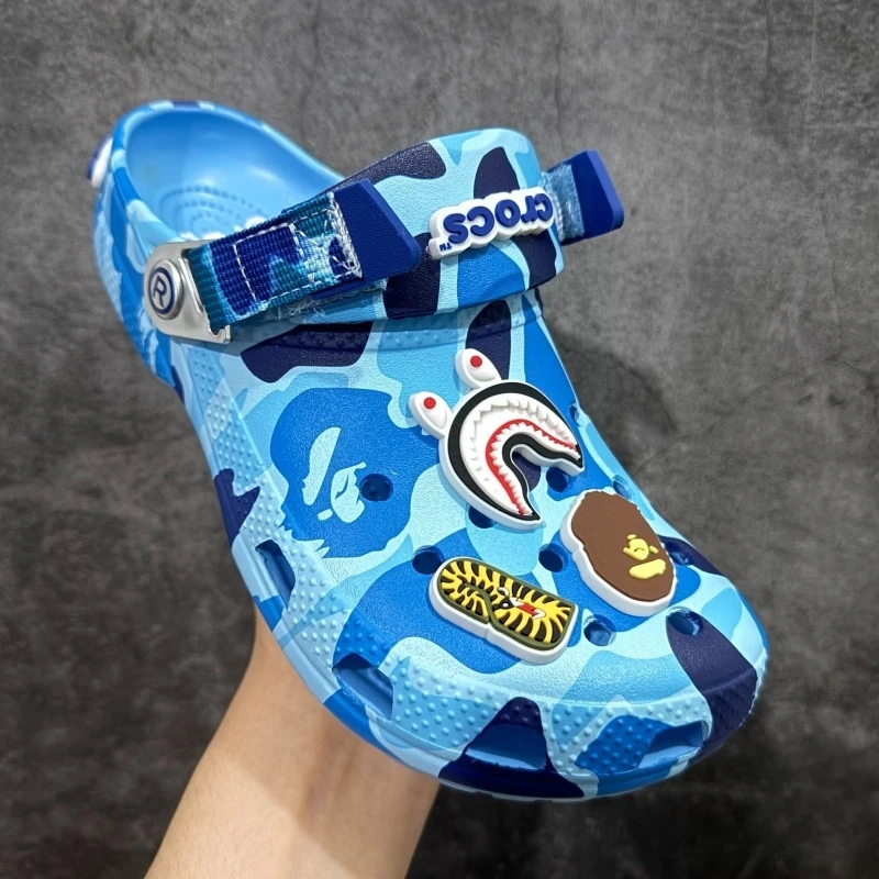 العلامة التجارية المشتركة الصيف المضادة للانزلاق في الهواء الطلق الساخن القرد الاتجاه أحذية الشاطئ عادية ثقب ثقب النعال مريحة تنفس الصنادل الهدايا