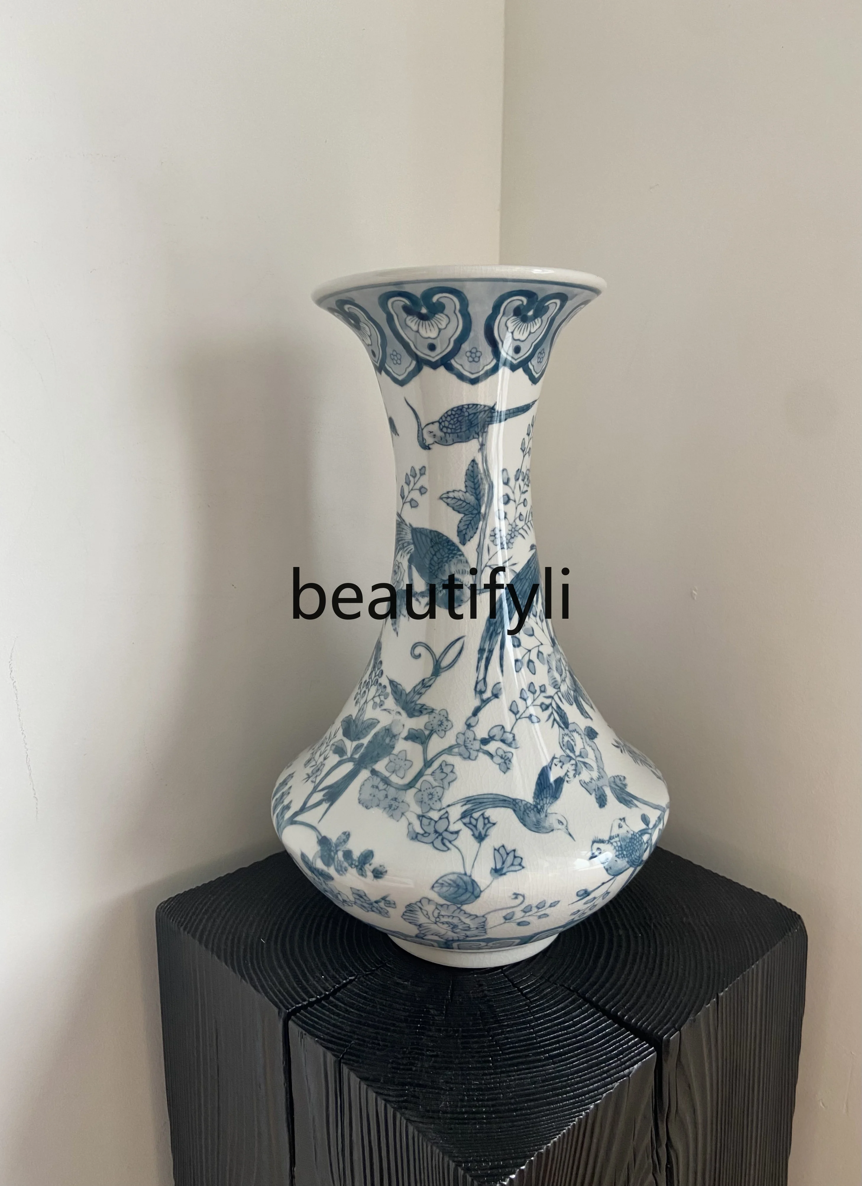 

Hand painted flower and bird blue and white porcelain waist vase