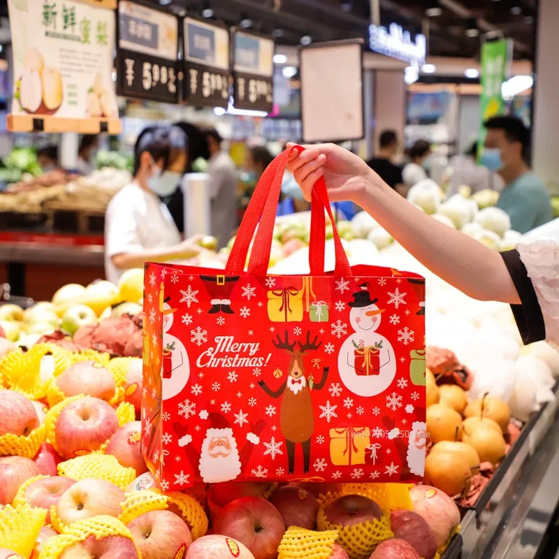 Borsa regalo di Natale Borse tote con fiocco di neve alce di Babbo Natale Borsa per imballaggio regalo di caramelle Borse impermeabili stampate in tessuto non tessuto addensato Regalo di Natale