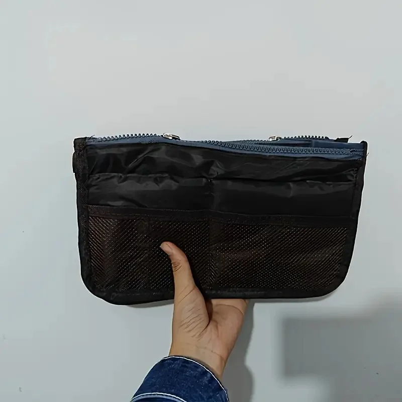 حقيبة أدوات الزينة للسفر للرجال والنساء. قماش أكسفورد خفيف الوزن ومتين مع جيوب بسحاب، قابل للغسل يدويًا.