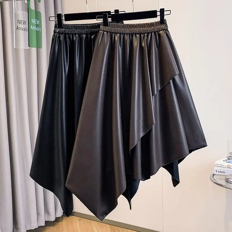 

New large size women's clothing autumn and winter design sense niche irregular protein leather elastic waist skirt
