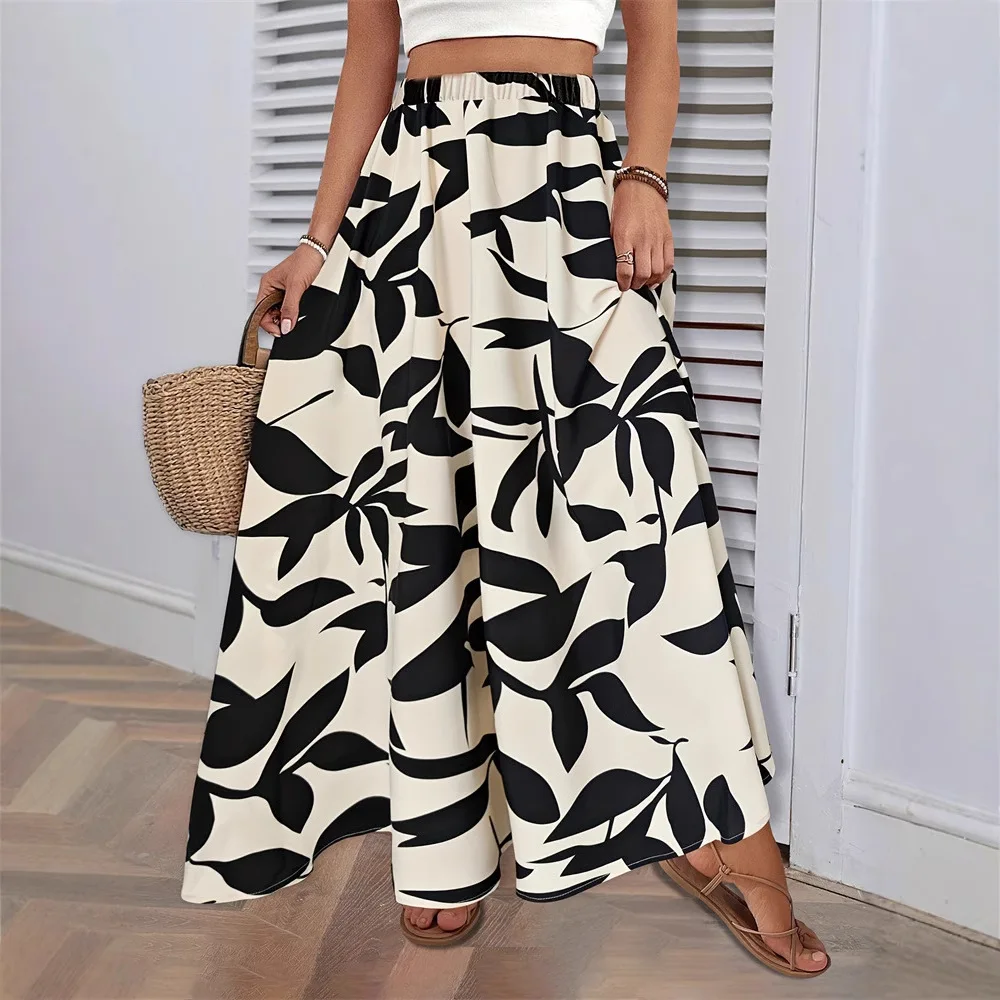 

Spring and summer women's new casual elastic waist half body skirt with leaf pattern beach skirt, loose and ankle long skirt