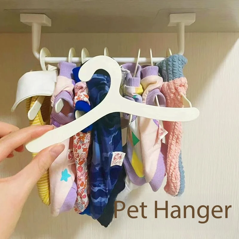 

Home & Garde Small fresh pet clothes hanger cat clothes hanger dog clothes support plastic clothes hanger 19CM hanger custom