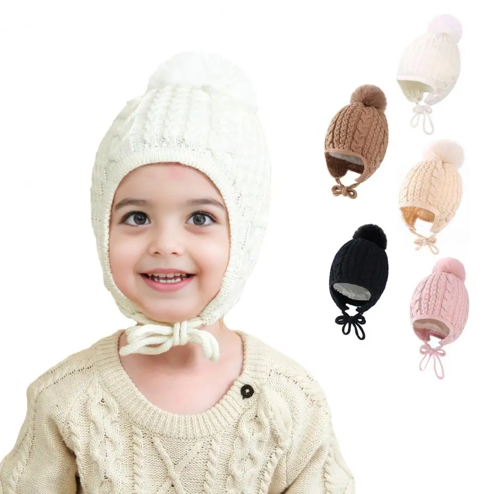 

Children Acrylic Hat Cozy Twist Texture Lace-up Knit Children's Winter Hat with Plush Ball Decor Solid Color Design for Warmth