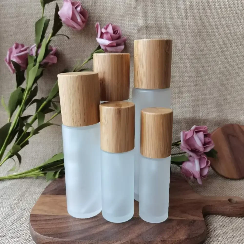 

Bamboo lotion bottle frosted glass bamboo cap bottles cosmetic containers lot Bamboo Lid Glass Bottle For Toner LotionPackaging