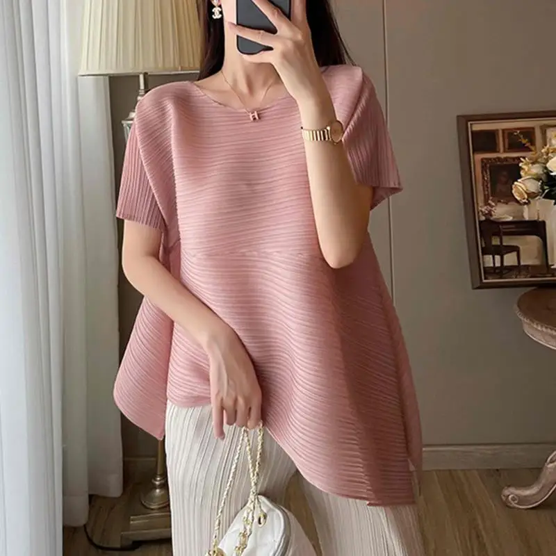 

Универсальный летний свободный топ в полоску с круглым вырезом и наклонным топом