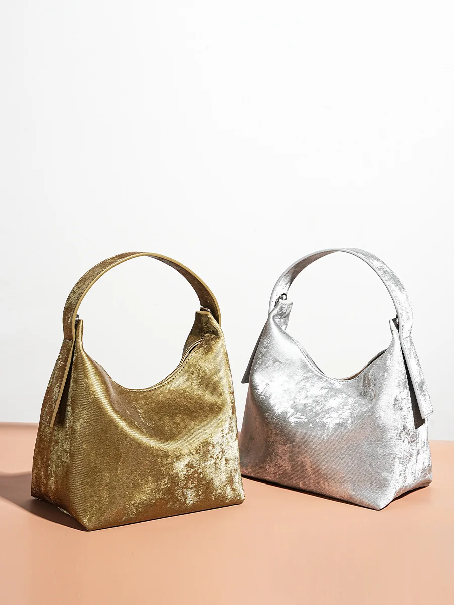 

Silver genuine leather one shoulder crossbody dumpling bag, exquisite cowhide, fashionable temperament, hand-held women's bag